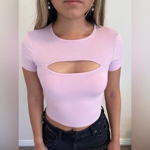 Cropped pink baby tee. Very flattering and tight fitting.